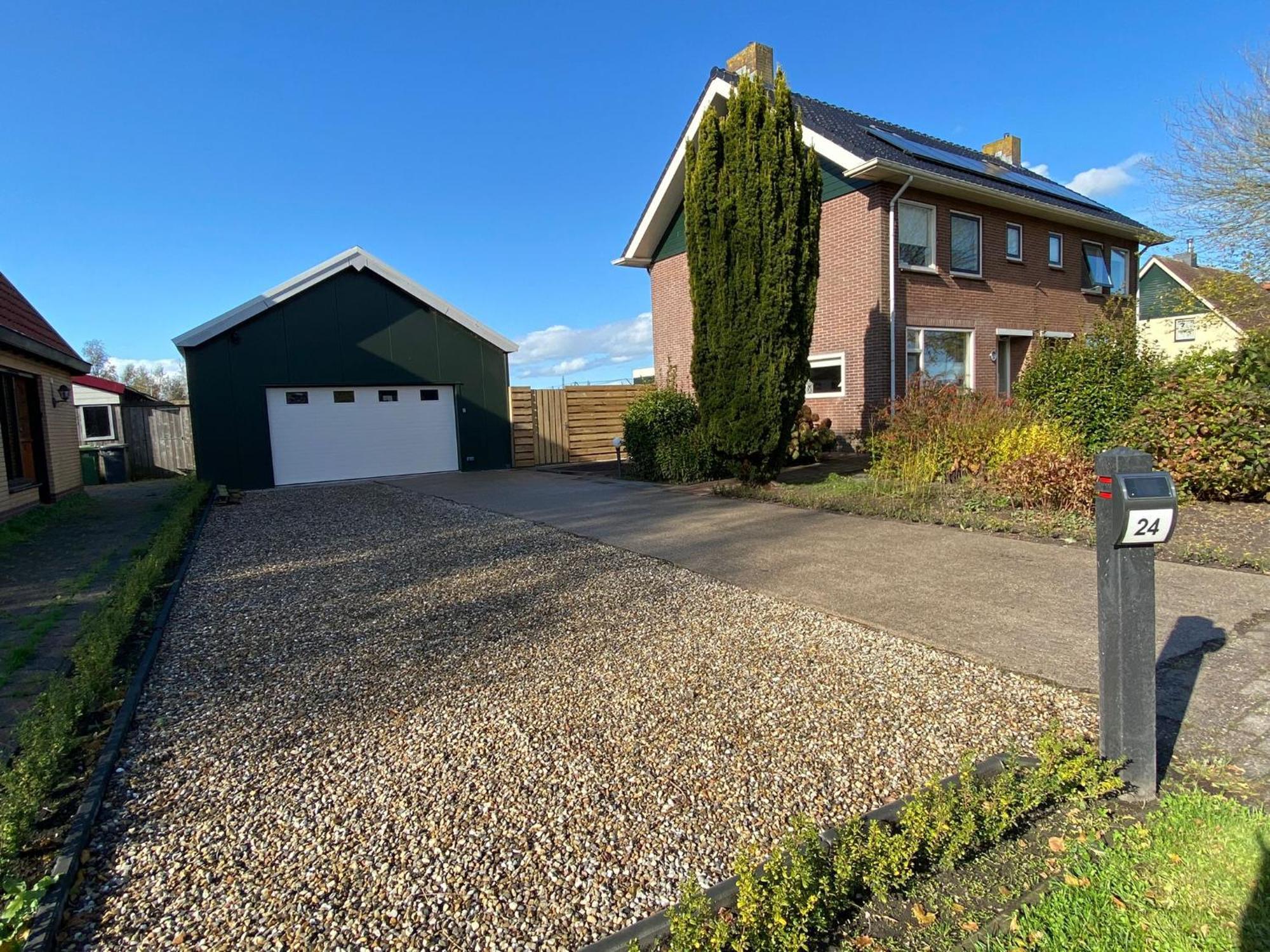 Huis Bij Het Water Met Sloepje Jutrijp Bagian luar foto