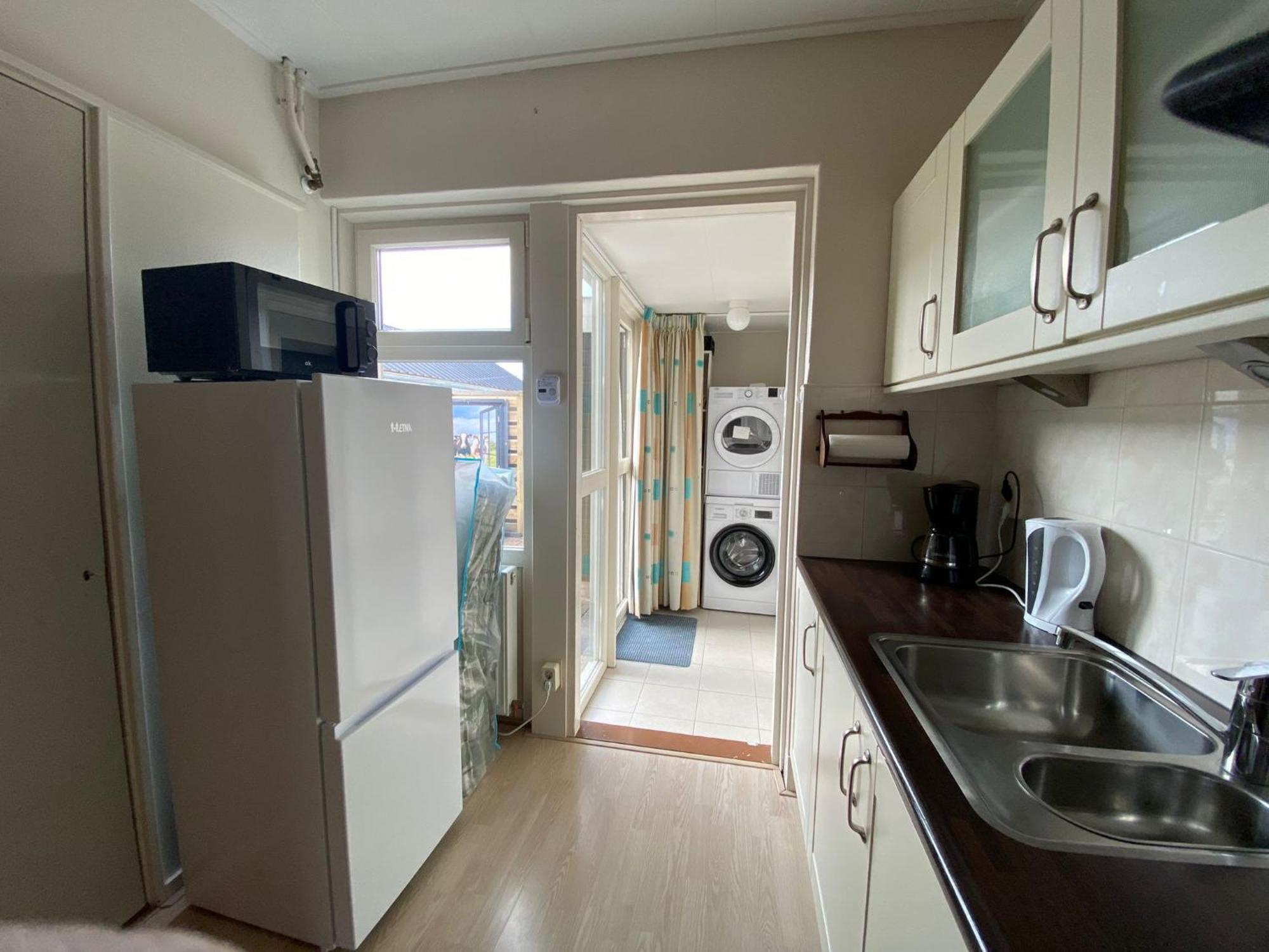 Huis Bij Het Water Met Sloepje Jutrijp Bagian luar foto